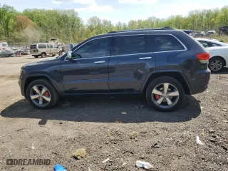 2014 Jeep Grand Cherokee Overland with VIN 1C4RJFCT1EC379867, listed as a Copart auction lot 54106375 with 217,908 mi miles and Clean Title. Bid and sale history available at carsss.com. Image 2.