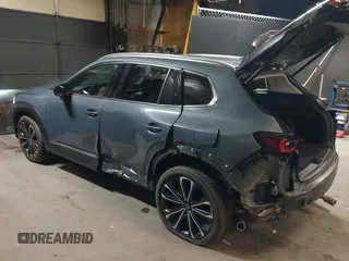 2023 Mazda CX-50 S Premium Plus with VIN 7MMVABEM3PN108555, listed as a IAAI auction lot 41202257 with 21,258 mi miles and . Bid and sale history available at DreamBid. Image 3.