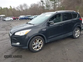 2014 Ford Escape Titanium with VIN 1FMCU9J99EUD38866, listed as a IAAI auction lot 42052579 with 202,337 mi miles. Bid and sale history available at carsss.com. Image 17.