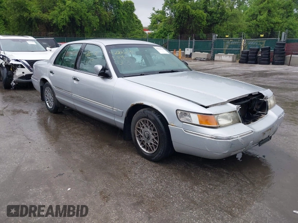2001 Mercury Grand Marquis GS z VIN 2MEFM74W91X618246, wystawiony jako IAAI lot #42226130 z przebiegiem 125 487 mil mil oraz . Historia ofert i sprzedaży dostępna na DreamBid. Obrazek 1.