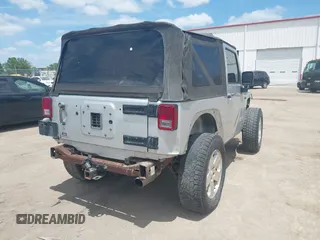 2009 Jeep Wrangler X with VIN 1J4FA24189L755392, listed as a IAAI auction lot 42176130 with 97,644 mi miles and . Bid and sale history available at DreamBid. Image 4.