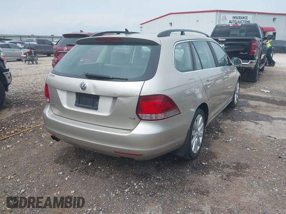 2014 Volkswagen Jetta TDI w/Sunroof with VIN 3VWPL7AJ8EM606766, listed as a IAAI auction lot 42440965 with 96,404 mi miles and . Bid and sale history available at DreamBid. Image 4.