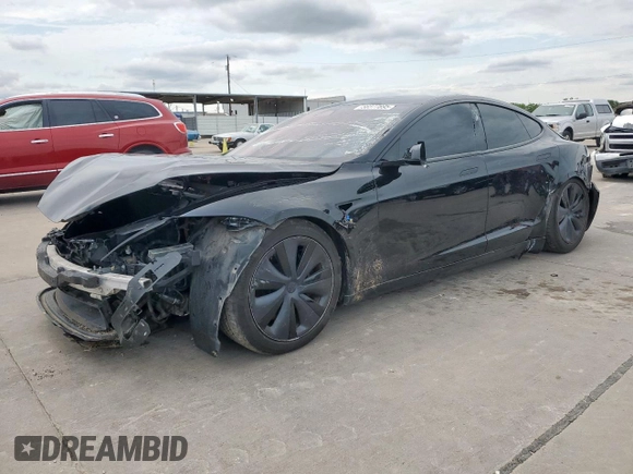 2023 Tesla Model S with VIN 5YJSA1E59PF512318, listed as a Copart auction lot 58377895 with 34,402 mi miles and Salvage title. Bid and sale history available at DreamBid. Image 1.