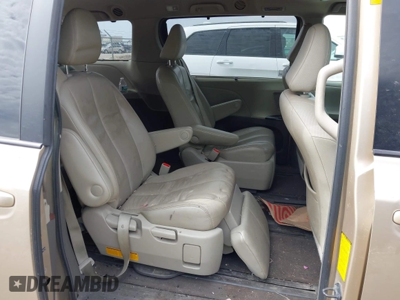 2013 Toyota Sienna XLE with VIN 5TDDK3DC4DS055796, listed as a IAAI auction lot 41993530 with 256,735 mi miles and . Bid and sale history available at DreamBid. Image 8.