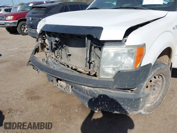 2013 Ford F-150 XL with VIN 1FTMF1CM2DKE67824, listed as a IAAI auction lot 41822285 with 181,957 mi miles and . Bid and sale history available at carsss.com. Image 17.