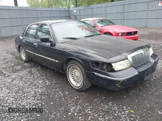 2002 Mercury Grand Marquis LS Premium z VIN 2MEFM75W42X644236, wystawiony jako IAAI lot #42276863 z przebiegiem 56 460 mil mil oraz . Historia ofert i sprzedaży dostępna na DreamBid. Obrazek 1.