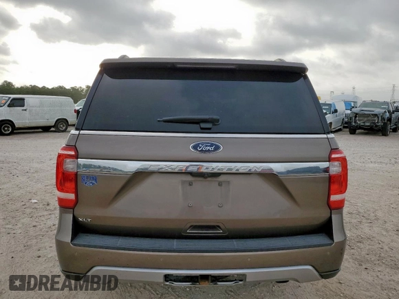 2018 Ford Expedition XLT with VIN 1FMJU1HT8JEA70326, listed as a Copart auction lot 57042785 with 123,249 mi miles and Salvage title. Bid and sale history available at DreamBid. Image 6.