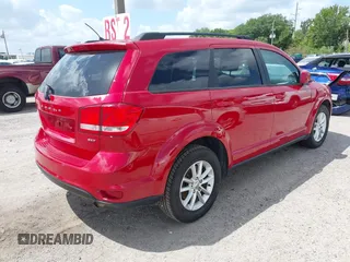 2015 Dodge Journey SXT with VIN 3C4PDCBB2FT560777, listed as a IAAI auction lot 42017660 with 132,628 mi miles and . Bid and sale history available at DreamBid. Image 4.