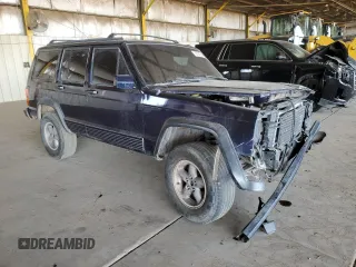 1996 Jeep Cherokee Sport with VIN 1J4FT68S1TL275271, listed as a Copart auction lot 72701214 with 235,651 mi miles and Salvage Title. Bid and sale history available at carsss.com. Image 4.