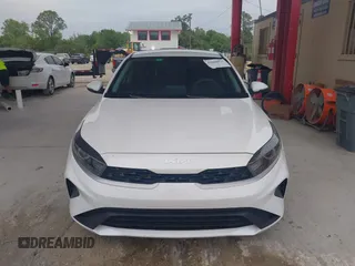 2023 Kia Forte LXS z VIN 3KPF24AD4PE612653, wystawiony jako IAAI lot #41660877 z przebiegiem 16 920 mil mil oraz . Historia ofert i sprzedaży dostępna na DreamBid. Obrazek 12.