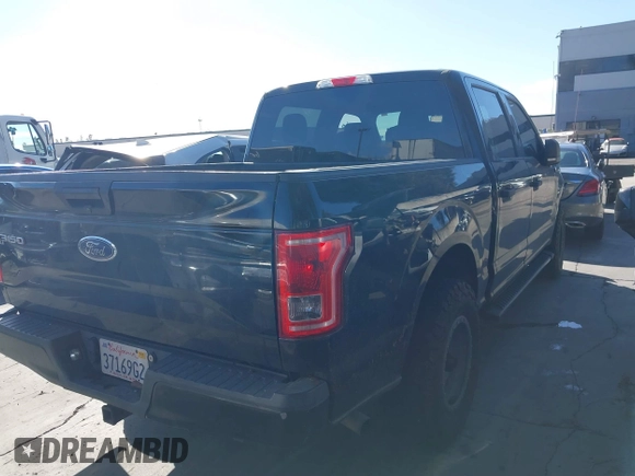 2015 Ford F-150 XL with VIN 1FTEW1CGXFKD98530, listed as a IAAI auction lot 41687753 with 104,281 mi miles. Bid and sale history available at carsss.com. Image 4.