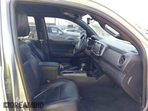 2020 Toyota Tacoma SR5 with VIN 3TMAZ5CN7LM138859, listed as a IAAI auction lot 42150725 with 36,462 mi miles and . Bid and sale history available at DreamBid. Image 5.