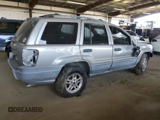 2001 Jeep Grand Cherokee Laredo with VIN 1J4GX48S61C603035, listed as a Copart auction lot 50267945 with 320,564 mi miles and Salvage title. Bid and sale history available at DreamBid. Image 3.