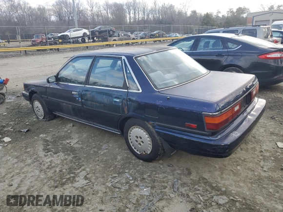 1989 Toyota Camry z VIN 4T1SV22E0KU032677, wystawiony jako Copart lot #46308555 z przebiegiem 993 896 mil mil oraz Czysty tytuł • Clean title. Historia ofert i sprzedaży dostępna na DreamBid. Obrazek 2.