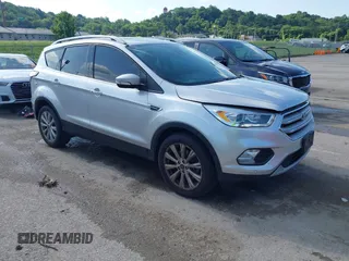 2018 Ford Escape Titanium z VIN 1FMCU0J97JUA23151, wystawiony jako IAAI lot #42549507 z przebiegiem 92 035 mil mil oraz . Historia ofert i sprzedaży dostępna na DreamBid. Obrazek 1.