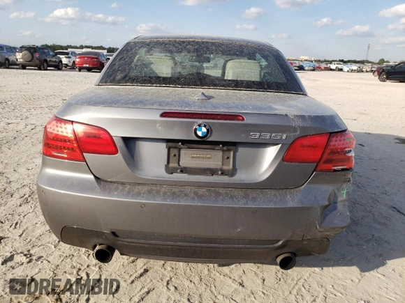 2011 BMW 3 Series 335i with VIN WBADX7C5XBE580244, listed as a Copart auction lot 44993215 with 124,091 mi miles and Salvage Title. Bid and sale history available at carsss.com. Image 6.