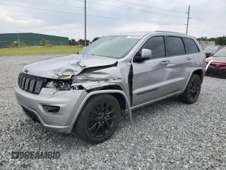 2017 Jeep Grand Cherokee Laredo with VIN 1C4RJEAG4HC780219, listed as a Copart auction lot 58692835 with 151,994 mi miles and Salvage title. Bid and sale history available at DreamBid. Image 1.