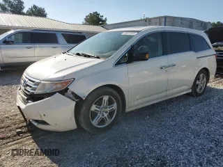 2013 Honda Odyssey Touring with VIN 5FNRL5H90DB003003, listed as a Copart auction lot 58519345 with 259,383 mi miles and Salvage title. Bid and sale history available at DreamBid. Image 1.