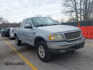 2003 Ford F-150 XL with VIN 1FTRX18L13NA95540, listed as a IAAI auction lot 41879632 with 1 mi miles. Bid and sale history available at carsss.com. Image 1.