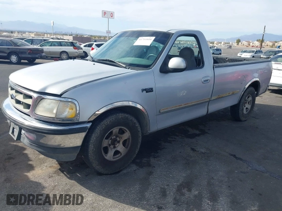 1997 Ford F-150 with VIN 1FTEF17W3VLA19510, listed as a IAAI auction lot 41711010 with 214,984 mi miles and . Bid and sale history available at DreamBid. Image 12.