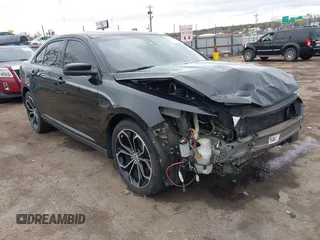 2013 Ford Taurus SHO z VIN 1FAHP2KT1DG113007, wystawiony jako IAAI lot #41914541 z przebiegiem 50 630 mil mil oraz . Historia ofert i sprzedaży dostępna na DreamBid. Obrazek 1.