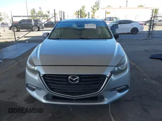 2018 Mazda 3 Touring with VIN 3MZBN1L31JM163466, listed as a IAAI auction lot 40777124 with 101,497 mi miles and . Bid and sale history available at carsss.com. Image 11.