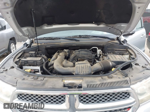 2013 Dodge Durango SXT with VIN 1C4RDHAG8DC647434, listed as a IAAI auction lot 42368085 with 77,533 mi miles and . Bid and sale history available at DreamBid. Image 10.