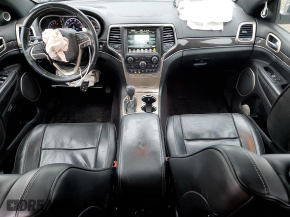 2017 Jeep Grand Cherokee Overland with VIN 1C4RJFCG8HC607872, listed as a Copart auction lot 57493195 with 164,478 mi miles and Salvage title. Bid and sale history available at DreamBid. Image 8.