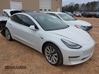 2020 Tesla Model 3 Standard Range Plus with VIN 5YJ3E1EA1LF738062, listed as a IAAI auction lot 41747581 with 41,897 mi miles. Bid and sale history available at carsss.com. Image 1.