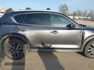 2018 Mazda CX-5 Grand Touring with VIN JM3KFBDM0J0405574, listed as a IAAI auction lot 41725319 with 44,380 mi miles. Bid and sale history available at carsss.com. Image 13.