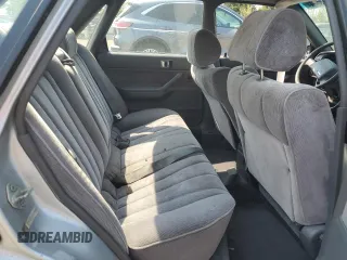 1989 Toyota Camry LE ECT z VIN JT2SV22E3K3346603, wystawiony jako Copart lot #62570044 z przebiegiem 213 105 mil mil oraz Szkoda całkowita • Salvage title. Historia ofert i sprzedaży dostępna na DreamBid. Obrazek 11.