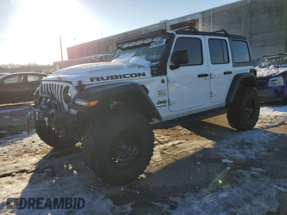 2018 Jeep Wrangler Unlimited Rubicon with VIN 1C4HJXFG8JW104425, listed as a Copart auction lot 87545965 with 62,988 mi miles and Salvage title. Bid and sale history available at DreamBid. Image 1.