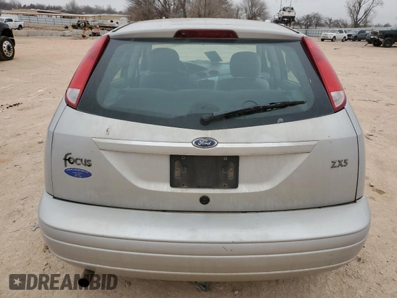 2004 Ford Focus with VIN 3FAFP37Z14R102723, listed as a Copart auction lot 44138195 with 220,354 mi miles and Salvage title. Bid and sale history available at DreamBid. Image 6.