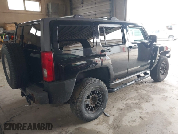 2006 Hummer H3 with VIN 5GTDN136268164216, listed as a IAAI auction lot 42131047 with 218,659 mi miles. Bid and sale history available at carsss.com. Image 4.