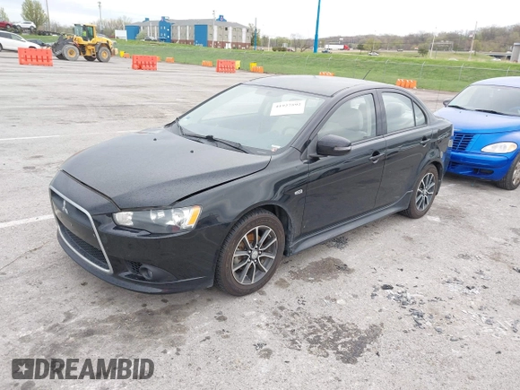 2015 Mitsubishi Lancer SE with VIN JA32V2FW2FU002303, listed as a IAAI auction lot 41927592 with 32,444 mi miles. Bid and sale history available at carsss.com. Image 2.