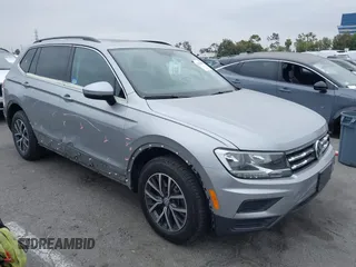 2020 Volkswagen Tiguan SE z VIN 3VV3B7AX0LM108973, wystawiony jako IAAI lot #42378089 z przebiegiem 70 914 mil mil oraz . Historia ofert i sprzedaży dostępna na DreamBid. Obrazek 1.