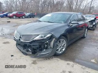 2015 Lincoln MKZ z VIN 3LN6L2JK4FR623686, wystawiony jako IAAI lot #41721095 z przebiegiem 197 922 mil mil oraz . Historia ofert i sprzedaży dostępna na DreamBid. Obrazek 18.
