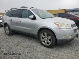 2012 Chevrolet Traverse LTZ z VIN 1GNKRLED8CJ262091, wystawiony jako Copart lot #55527805 z przebiegiem Nie podano mil oraz Szkoda całkowita • Salvage title. Historia ofert i sprzedaży dostępna na DreamBid. Obrazek 4.