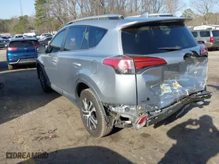 2016 Toyota RAV4 LE with VIN 2T3ZFREV0GW235051, listed as a IAAI auction lot 41750295 with 157,132 mi miles. Bid and sale history available at carsss.com. Image 3.