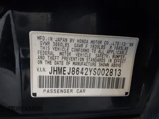 2000 Honda Civic EX with VIN JHMEJ8642YS002813, listed as a IAAI auction lot 41393115 with 168,674 mi miles. Bid and sale history available at carsss.com. Image 9.