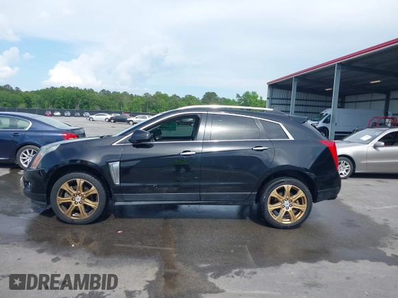 2014 Cadillac SRX Performance Collection with VIN 3GYFNCE31ES683465, listed as a IAAI auction lot 42107705 with 117,285 mi miles. Bid and sale history available at carsss.com. Image 14.