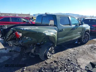 2021 Toyota Tacoma SR with VIN 3TMCZ5AN7MM395940, listed as a IAAI auction lot 41240832 with 39,338 mi miles and . Bid and sale history available at DreamBid. Image 4.