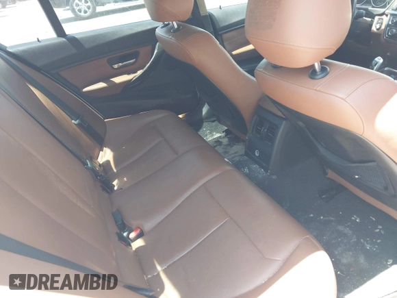 2014 BMW 3 Series 328i with VIN WBA3A5C54EP600398, listed as a IAAI auction lot 42665302 with 117,012 mi miles and . Bid and sale history available at DreamBid. Image 8.