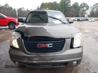 2014 GMC Yukon SLT with VIN 1GKS1CE00ER164663, listed as a IAAI auction lot 41547771 with 178,998 mi miles. Bid and sale history available at carsss.com. Image 6.