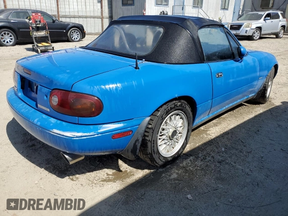 1991 Mazda MX-5 Miata Special Edition z VIN JM1NA3510M1218378, wystawiony jako Copart lot #57149615 z przebiegiem 147 632 mil mil oraz Czysty tytuł • Clean title. Historia ofert i sprzedaży dostępna na DreamBid. Obrazek 3.