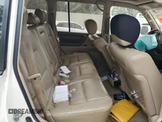 2000 Toyota Land Cruiser with VIN JT3HT05J9Y0101498, listed as a Copart auction lot 76126734 with 173,138 mi miles and Salvage Title. Bid and sale history available at carsss.com. Image 11.