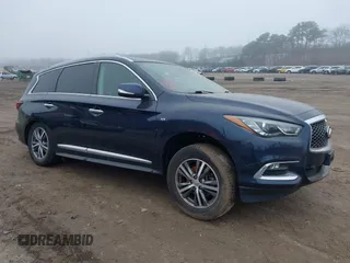 2020 Infiniti QX60 Pure with VIN 5N1DL0MM0LC515634, listed as a IAAI auction lot 41904883 with 26,722 mi miles and . Bid and sale history available at DreamBid. Image 1.