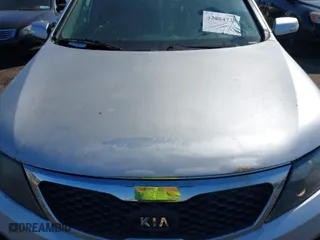 2012 Kia Sorento LX with VIN 5XYKT3A12CG290507, listed as a IAAI auction lot 42004725 with 299,075 mi miles. Bid and sale history available at carsss.com. Image 12.