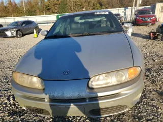2001 Oldsmobile Aurora z VIN 1G3GR64H514125528, wystawiony jako Copart lot #81910664 z przebiegiem 117 926 mil mil oraz Tytuł czysty. Historia ofert i sprzedaży dostępna na DreamBid. Obrazek 5.