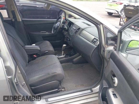 2012 Nissan Versa S with VIN 3N1BC1CP9CK239898, listed as a IAAI auction lot 42210704 with 97,714 mi miles and . Bid and sale history available at DreamBid. Image 5.